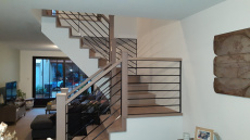 Escalier chêne blanchi et barres de 12 mm noires